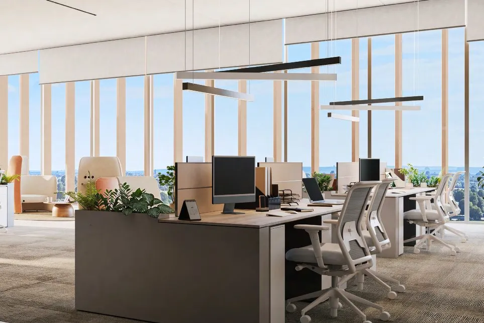 Open-plan office with desks and floor-to-ceiling windows