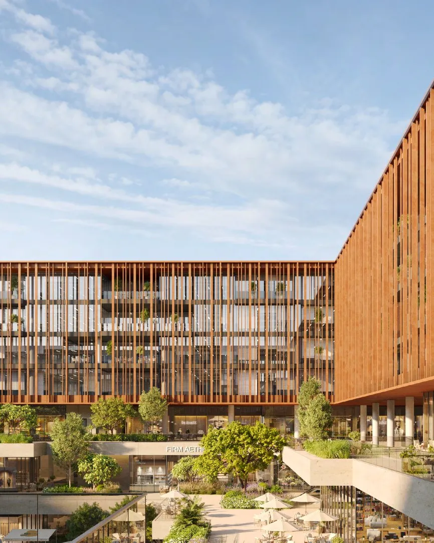 Louvred office façade above a terraced courtyard with cafés and trees