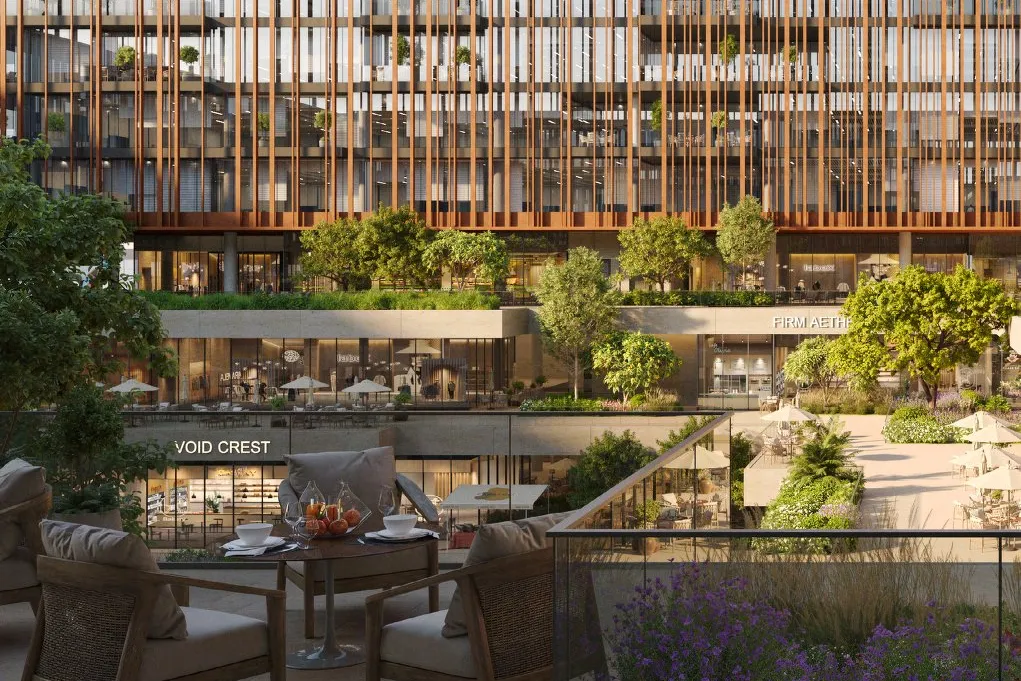 Terrace seating overlooking the courtyard, shops and louvred offices